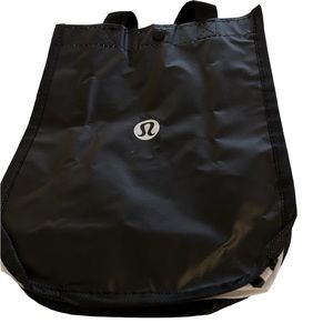 Small, black Lululemon reusable tote bag.